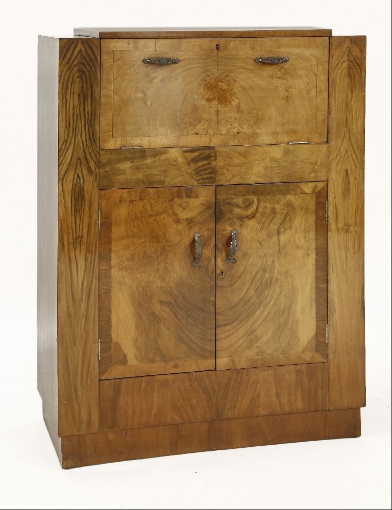 An Art Deco burr walnut cocktail cabinet,labelled 'Hospitality Cabinet' the hinged top, opening to - Image 2 of 2