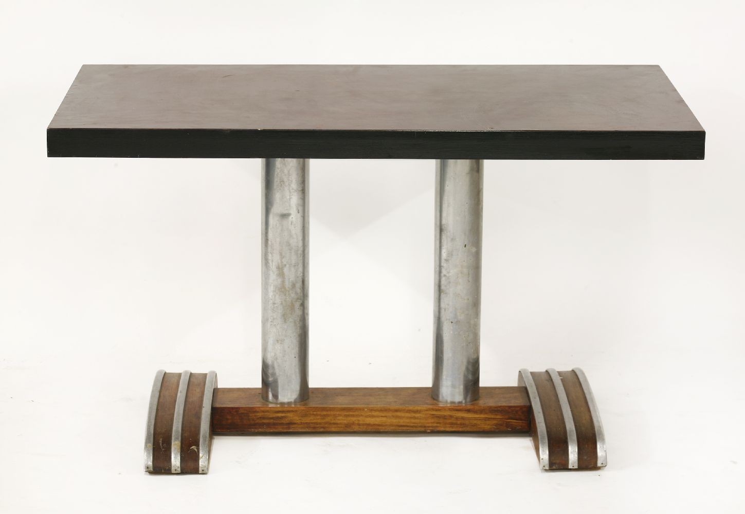 An Art Deco-style coffee table,with a composition top raised on twin columns and chrome mount