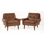 A pair of lounge armchairs,with brown leather upholstery (2)