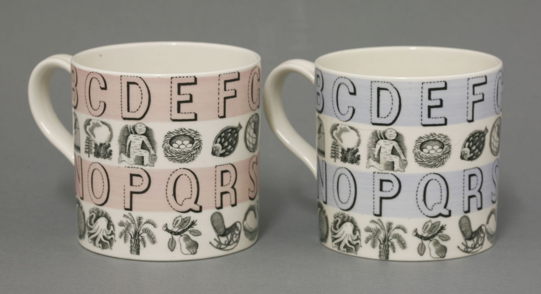 Two Wedgwood 'Alphabet' mugs,designed by Eric Ravilious, with pink and blue banding,8cm high (2) - Image 2 of 3