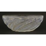 A Lalique 'Poissons No.1' glass bowl,clear and opalescent moulded with fish, moulded 'R. Lalique'