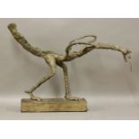 A wire and composition painted sculpture,a dinosaur, on a fixed wood plinth,63cm long