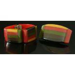 An Art Deco Bakelite hinged bangle and brooch suite,the bangle with a hinged red tapering body, with