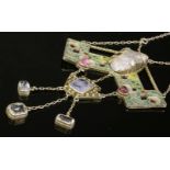 An Arts and Crafts silver gilt, blister pearl, pink tourmaline, sapphire, aquamarine and plique-à-