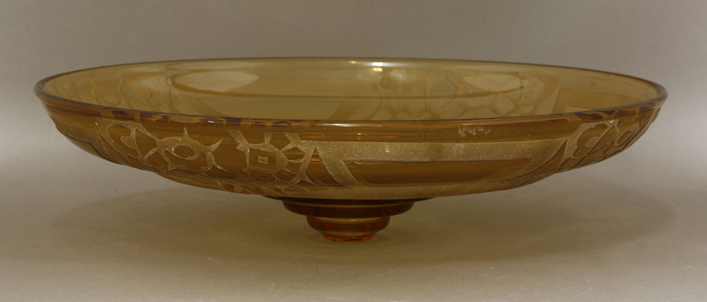 An amber glass dish,deeply engraved and etched with stylised floral designs, engraved 'H Delatte, - Image 2 of 3