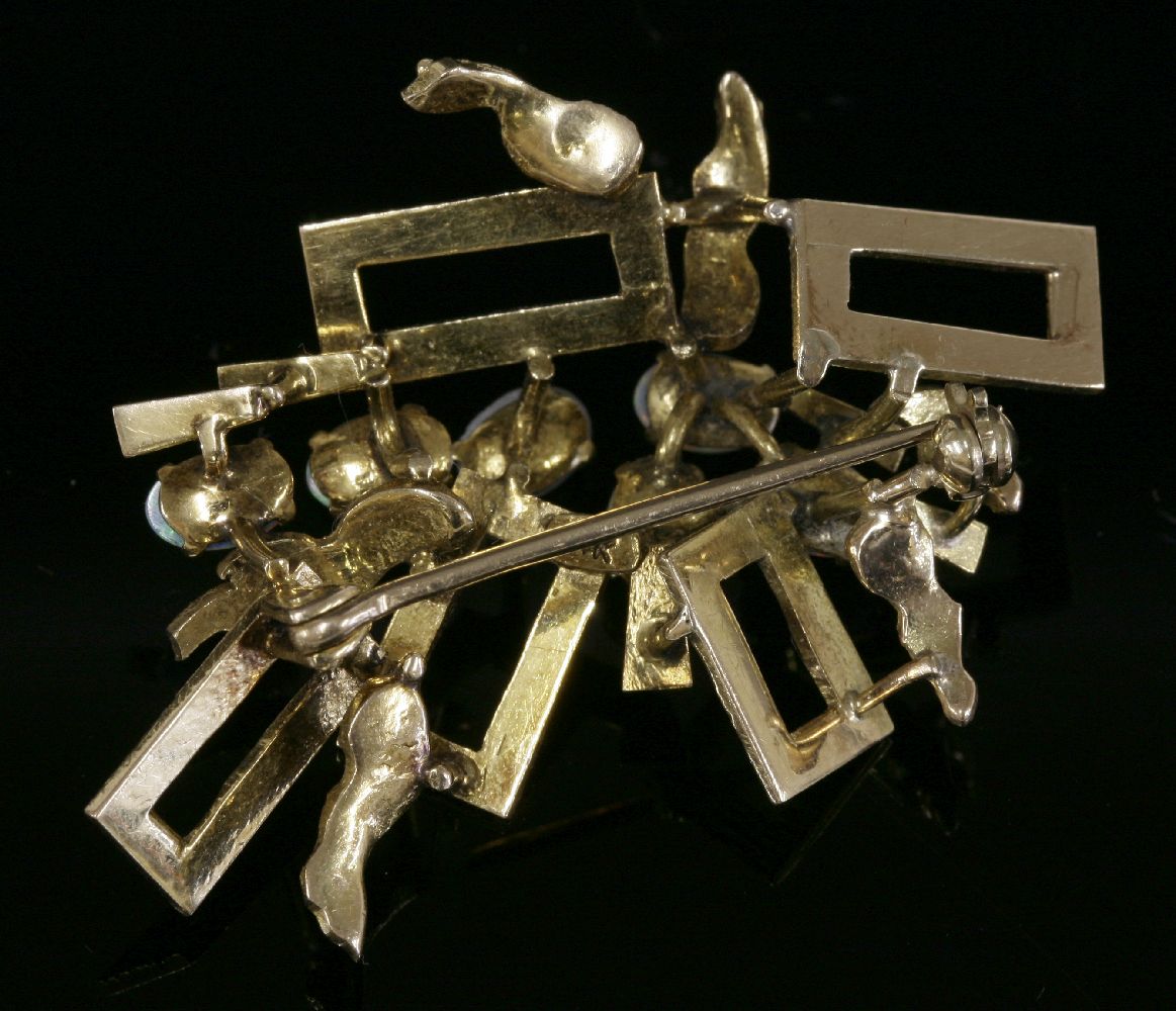 A Continental gold opal brooch, c.1970,with radiating rectangular frames, each frame with bark - Image 2 of 3