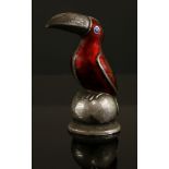 A sterling silver Danish novelty salt caster,by Meka, in the form of a toucan, red guilloché