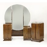 An Art Deco walnut dressing table,with a triptych mirror, over an unusual cupboard and three-