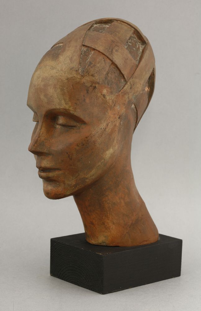 A head study,terracotta, on a painted wood plinth,30cm high