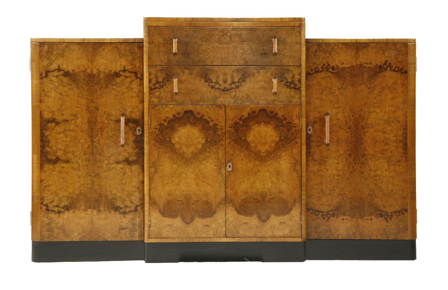 An Art Deco burr walnut sideboard, the raised centre with drawers over a cupboard, flanked with