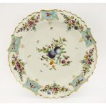 A rare Bow Plate,c.1763-1764, decorated with fruiting and flowering foliage within a border of