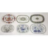 Six pottery Drainers,various floral patterns,29 to 38cm (6)