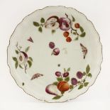 A Chelsea red anchor Plate,c.1750-1755, decorated with fruit and foliage interspersed with moths