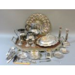 A silver plated and oak tray, a teaset, candlesticks, and other silver plate