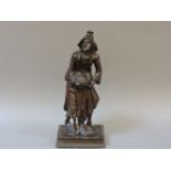 An Austrian carved wood figure of a beggar, 26.5cm high