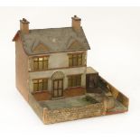 A Ron William Britains Dolly Varden doll's house and garden, circa 1930s