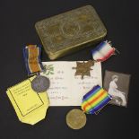Medals, a WWI trio to Gnr G E Rostrum, RFAL 16280, together with a 1914 Queen Mary gift tin