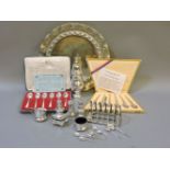 A collection of silver and silver plated items, including sugar caster, cruets, and two sets of