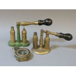 Two cartridge reloaders, and a military compass, F-L No 90609 1917