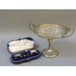 A silver comport, Martin Hall & Co, Sheffield 1911, and a cased set of salts