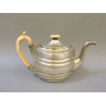 A Georgian oval silver teapot, maker 'TH', London 1807