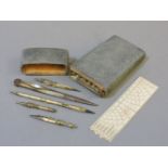 A George III shagreen writing instrument set, with a folding ruler, brass compass, and four