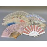 A collection of fans, including a hand painted 18th century example, damaged