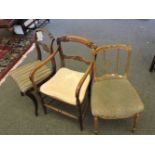 A 19th century faux rosewood carver armchair, a George V dining chair, and a gilt wood chair