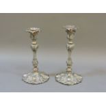 A pair of 19th century silver plated candlesticks, with detachable drip pans, 27cm high