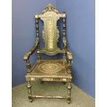 A 19th century Italian ebonised armchair, with decorative bone inlay