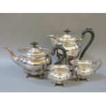 A four piece silver tea service, Birmingham 1928/1937, water jug 22cm high, approximately 52oz