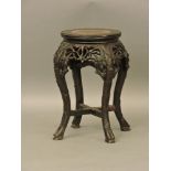A Chinese hardwood vase stand, with rouge marble top, 48cm high