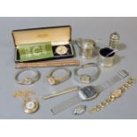 A silver three piece cruet set, ladies and gentlemens wristwatches, and silver pencil inscribed '