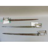 Three 1845 pattern socket sword bayonets, circa 1845, one Ricasso stamped with script initial over