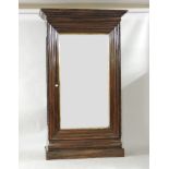 A French rosewood mirror door armoire, with a gilt bordered plate, the sides with spiral turned