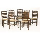 A set of eight ash and rush seated dining chairs, six standard and two carver