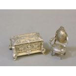 A cast silver vesta box, modelled as an early chest, London 1896, and a miniature French style