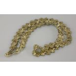 A 9ct gold crescent link necklace, 27.69g