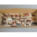 A box of Britain's lead horses, including heavy horses, arabs, hunters, and foals