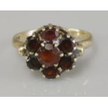 A 9ct gold garnet cluster ring