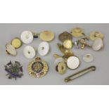 A Royal Engineers gold brooch, marked 9ct, a silver version, and assorted dress studs