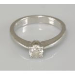 A platinum single stone diamond ring, by Fred E Ullman