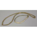 A 9ct gold three colour plaited herringbone necklace and bracelet suite, 14.6g