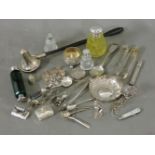 Silver items, wine taster, candle snuffer, green glass double end scent bottle, small toys, pair