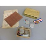 A Queen Mary tin containing WW1 and WW11 service medals, awarded to Sgt JH Morley, R SUSS R,