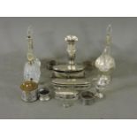 Silver items, scent bottles, dressing table boxes, napkin rings, pin cushion, vase, etc