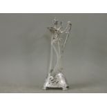 A WMF style Art Nouveau claret jug and cover, the plated mounts with a clear and cut glass body,