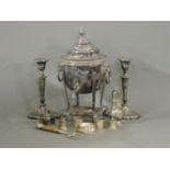 A silver plated samovar, a pair of silver plated candlesticks, sugar caster, etc