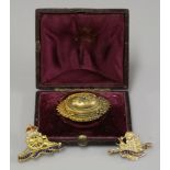 A Victorian gold Etruscan revival shield brooch, marked 15ct, a gold HMS Thunderer brooch marked