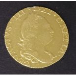 George III half guinea 1777, fourth head, evidence of soldered suspension ring, now removed